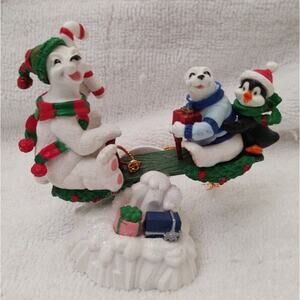 Image Creation Polar Bears On A Seesaw. Cute Winter or Christmas decoration !